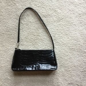 Black patent handbag